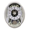 Moving Face Pendulum Wall Clock - Plays Melodies Every Hour *Free Shipping*