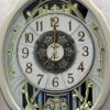 Moving Face Pendulum Wall Clock - Plays Melodies Every Hour *Free Shipping*